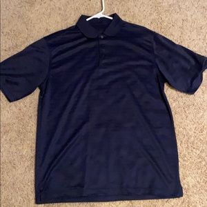 Blue shirt sleeve golf shirt.